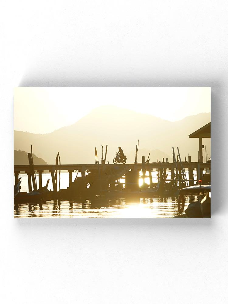 Riding A Motorcycle At A Pier Wrapped Canvas -Image by Shutterstock