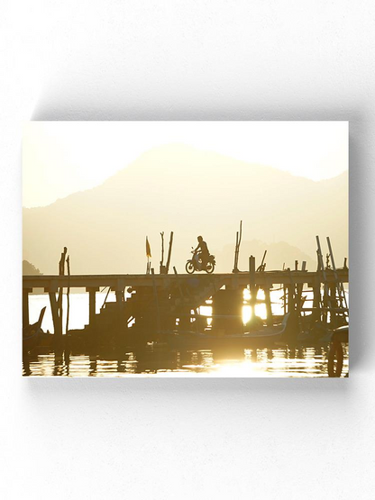 Riding A Motorcycle At A Pier Wrapped Canvas -Image by Shutterstock