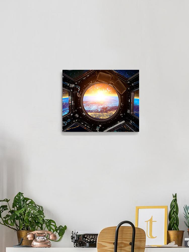 Spacecraft Over The Earth Wrapped Canvas -Image by Shutterstock