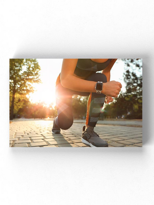 Runner Woman Getting Ready Wrapped Canvas -Image by Shutterstock