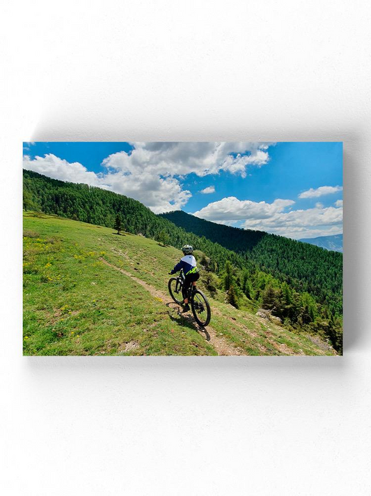 Biker In The Mountains Wrapped Canvas -Image by Shutterstock