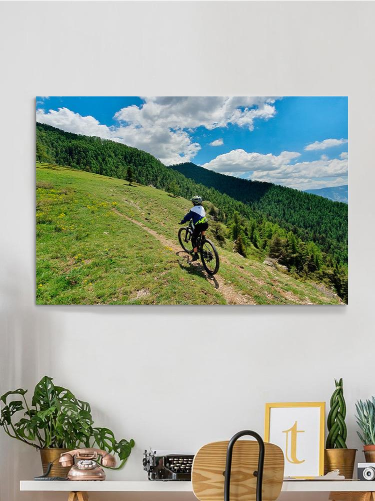 Biker In The Mountains Wrapped Canvas -Image by Shutterstock