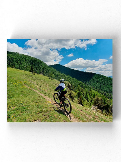 Biker In The Mountains Wrapped Canvas -Image by Shutterstock