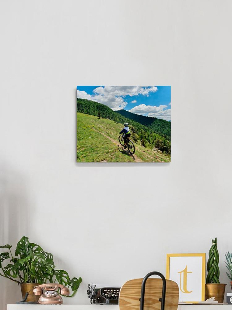 Biker In The Mountains Wrapped Canvas -Image by Shutterstock