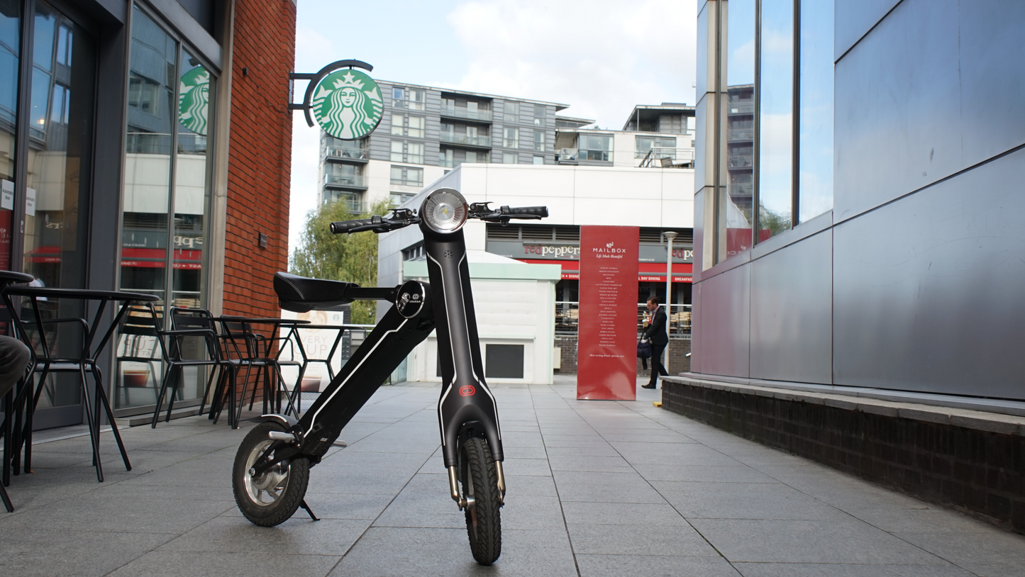 The Limited Edition Cruzaa Electric Scooter - 45km Range & 35kmh Top Speed Cruzaa Built in Bluetooth & Speakers + USB - Magno Green