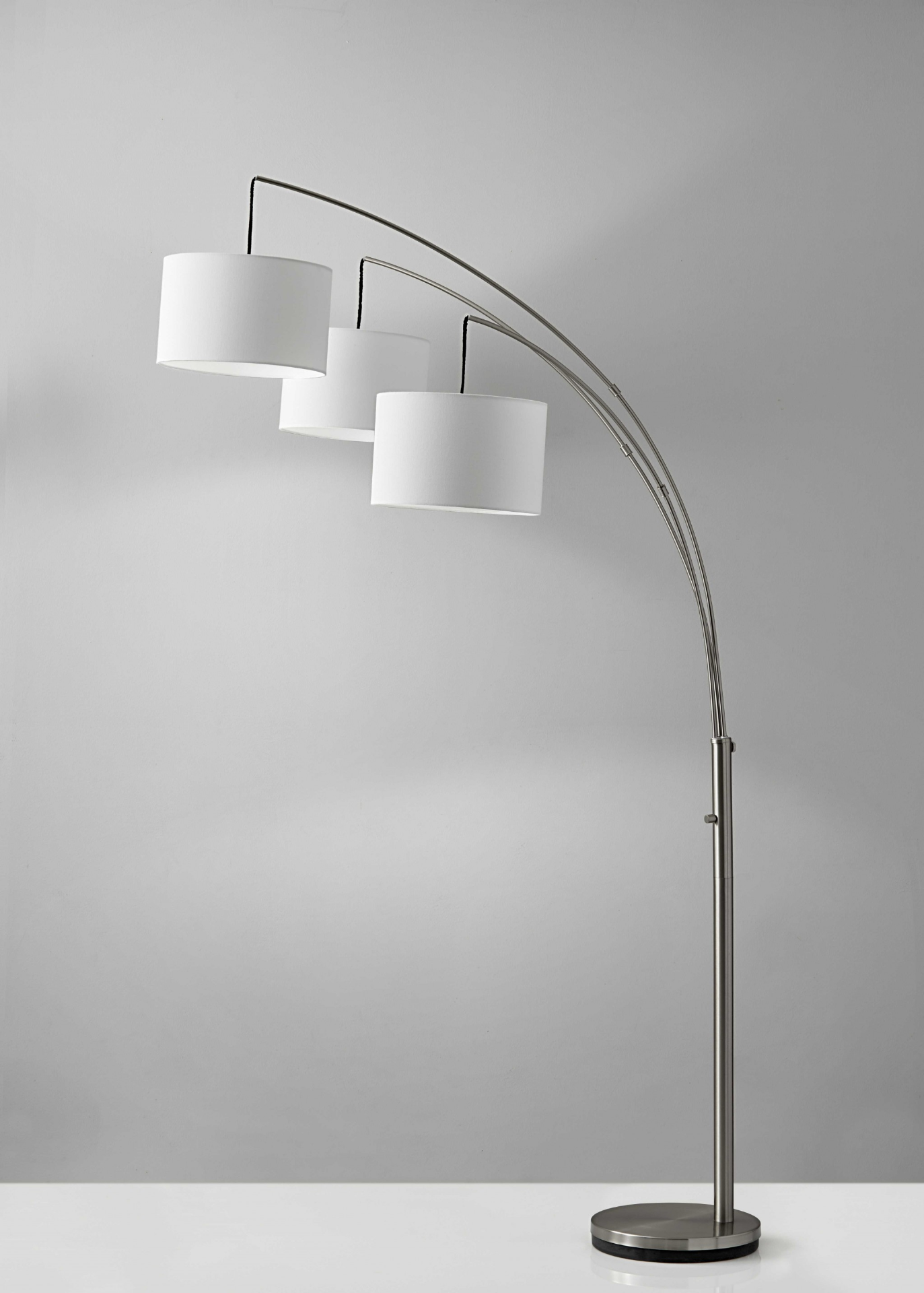 Three Light Brushed Steel Metal Arc Floor Lamp With Suspended White Drum Shades