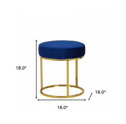 Compact Blue Velvet And Gold Round Ottoman