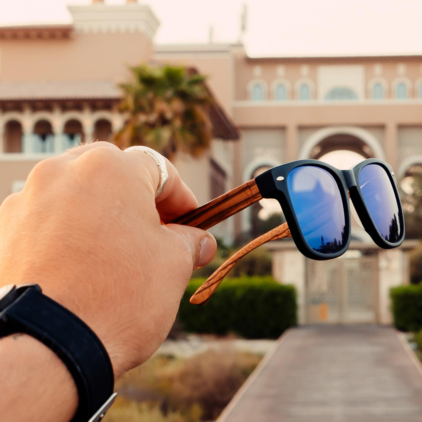 Zebra wood classic style sunglasses with blue mirrored polarized lenses